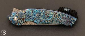 Couteau "  Framelock  " custom de Stéphane Sagric - Timascus et lame en Damasteel®